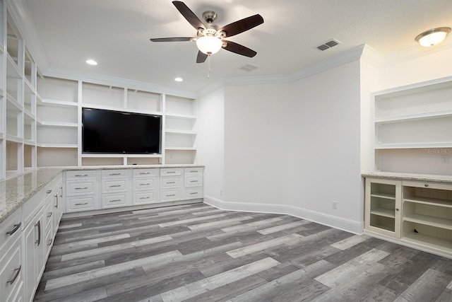 unfurnished living room with a textured ceiling, ornamental molding, ceiling fan, and hardwood / wood-style flooring