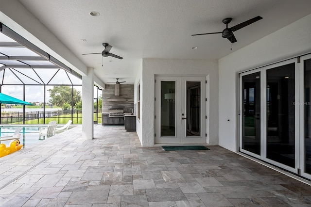 view of patio / terrace featuring a fenced in pool, a lanai, grilling area, ceiling fan, and french doors