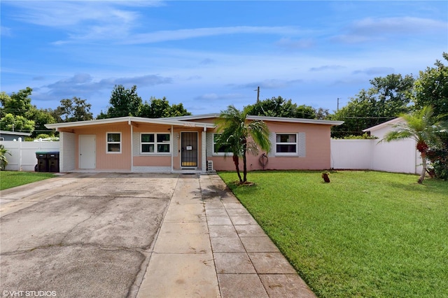 ranch-style house with a front yard