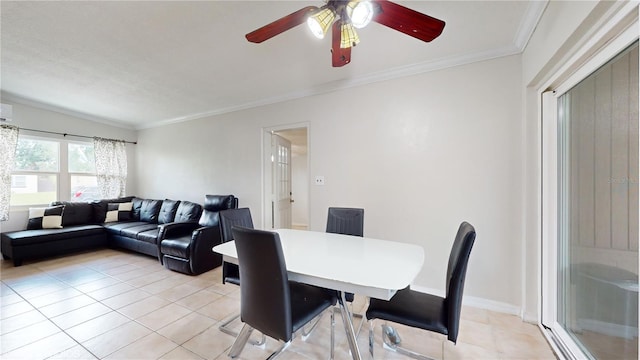 dining space with ceiling fan, light tile patterned floors, and crown molding