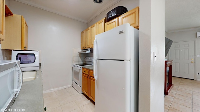 kitchen with backsplash, white appliances, ornamental molding, and light tile patterned floors