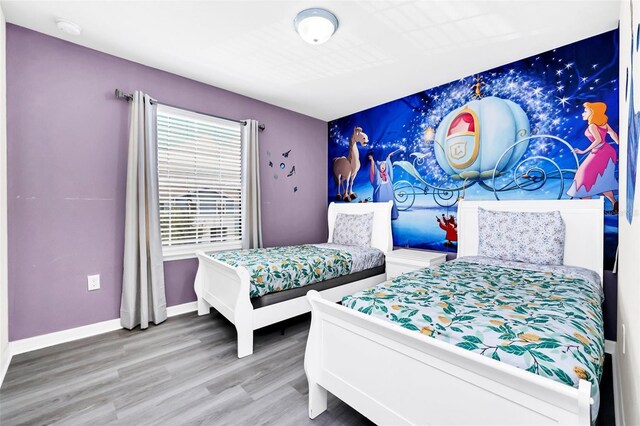 bedroom with wood-type flooring