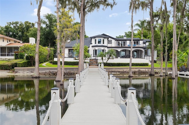 dock area with a water view