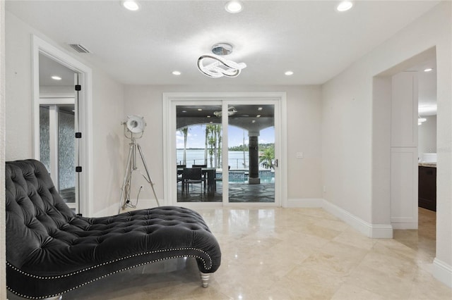 bedroom featuring recessed lighting, visible vents, baseboards, and access to exterior