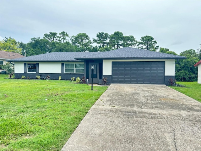 ranch-style house with a front yard and a garage