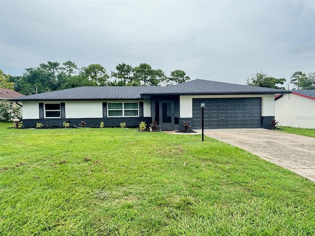 single story home featuring a garage and a front yard