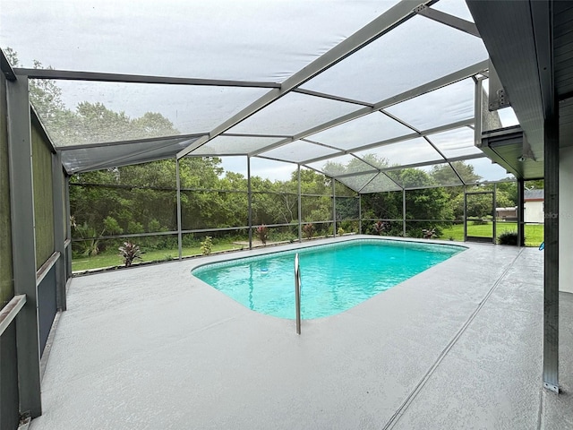 view of pool featuring a lanai and a patio area