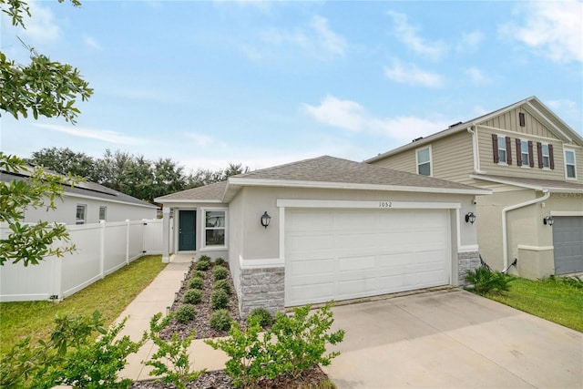 view of front of property featuring a garage