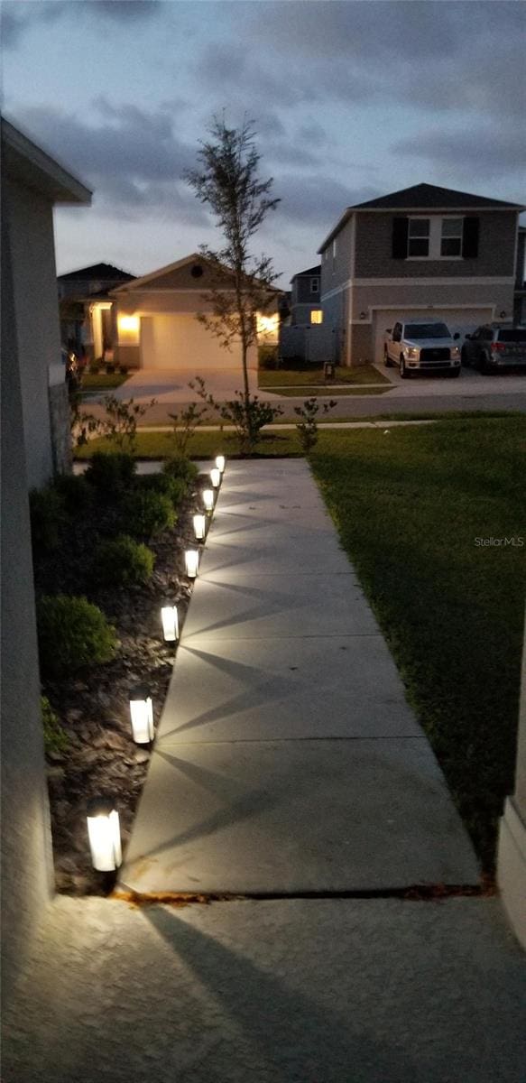 view of yard featuring a garage