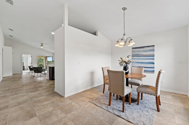 dining area featuring ceiling fan with notable chandelier and lofted ceiling