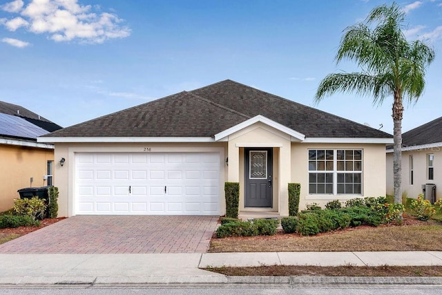 ranch-style home with a garage