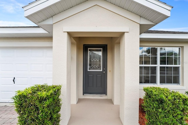 entrance to property with a garage