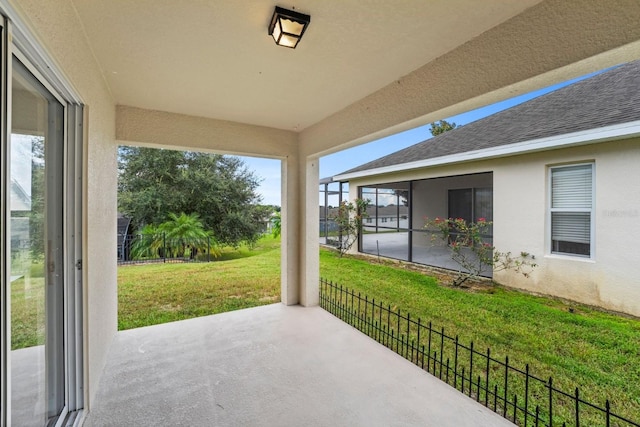 view of patio with a sunroom