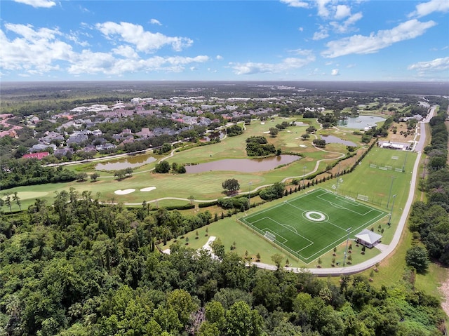 bird's eye view with view of golf course and a water view