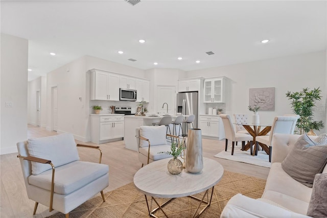 living room featuring light hardwood / wood-style floors