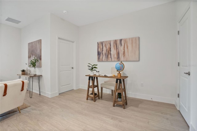 office space featuring light wood-type flooring