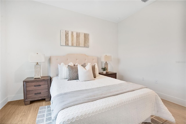 bedroom featuring light hardwood / wood-style floors