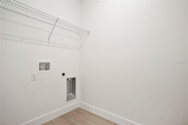 laundry room with washer hookup, hardwood / wood-style floors, and hookup for an electric dryer