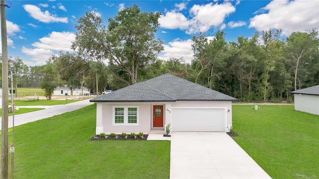 view of front facade featuring a garage and a front lawn