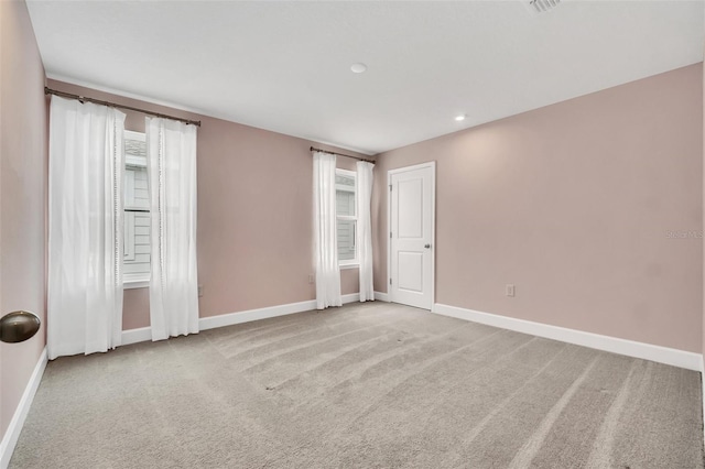 view of carpeted spare room