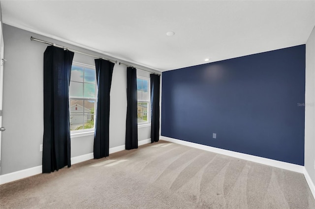 view of carpeted spare room