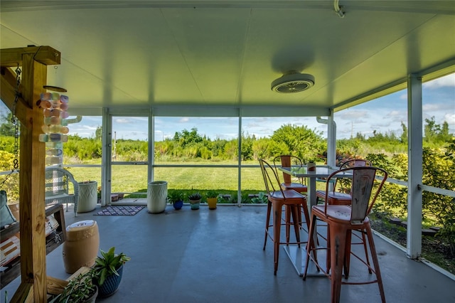 sunroom / solarium featuring plenty of natural light