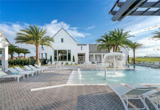 view of swimming pool featuring a patio and pool water feature