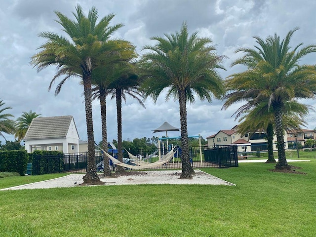 view of playground with a yard