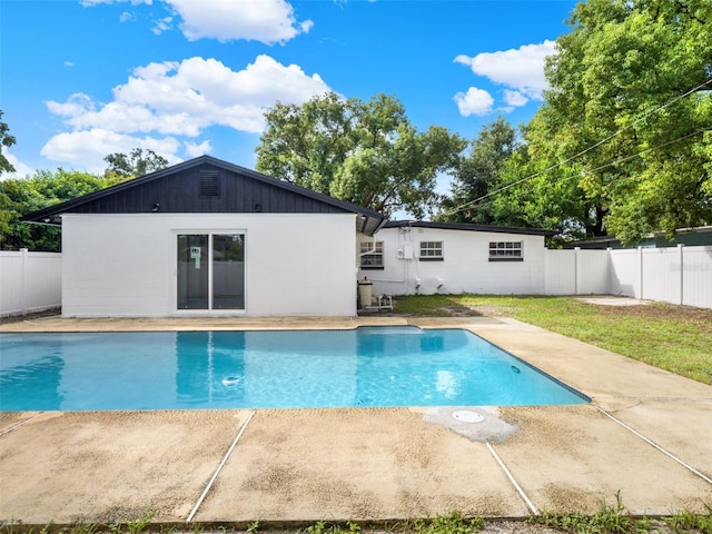 view of swimming pool with a patio