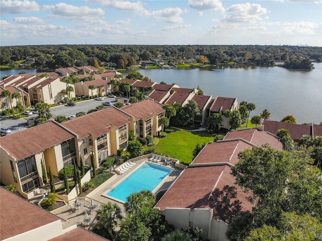 birds eye view of property featuring a water view