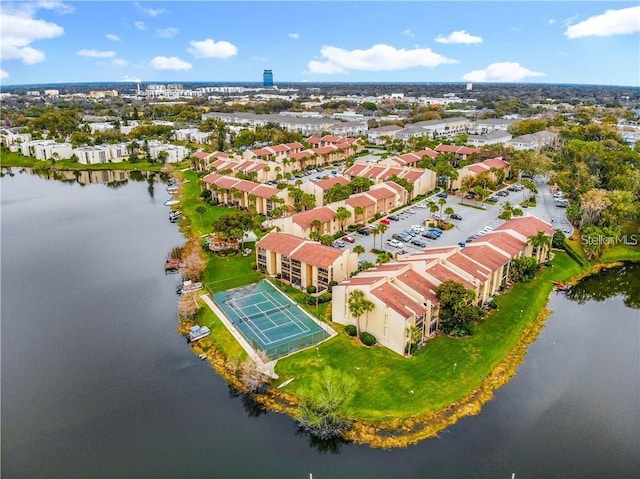 drone / aerial view with a water view