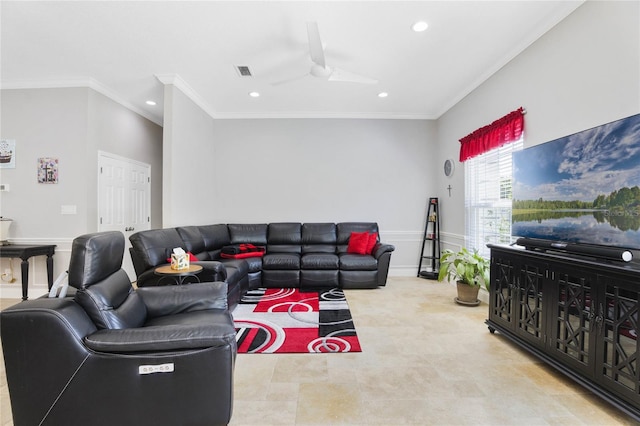 living room with crown molding and ceiling fan