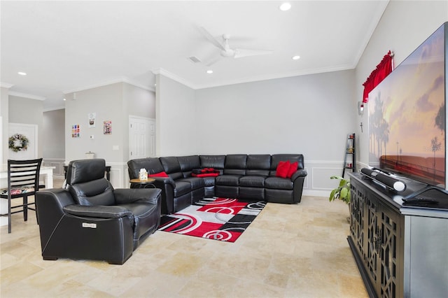 living room with ornamental molding and ceiling fan