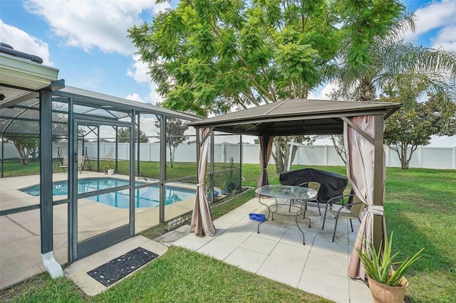 view of pool featuring a lawn, a gazebo, a lanai, and a patio