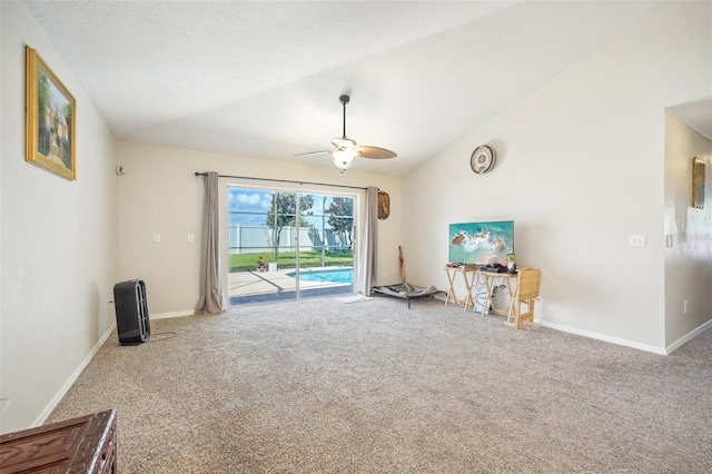 interior space featuring ceiling fan and carpet flooring