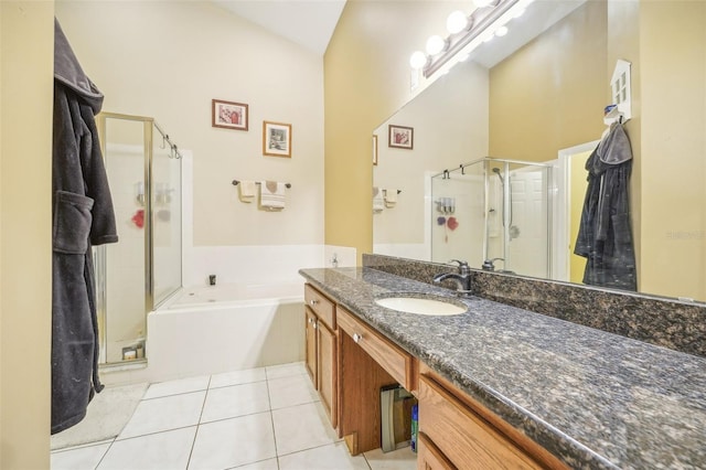 bathroom with vanity, shower with separate bathtub, and tile patterned floors