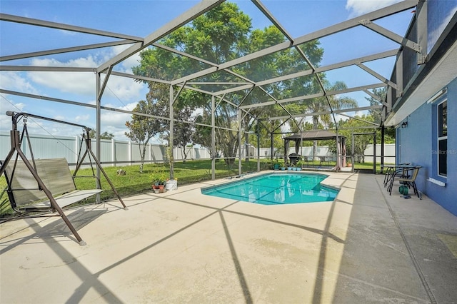 view of pool with a lanai and a patio area