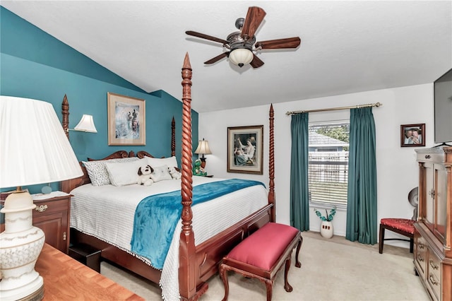 bedroom featuring light carpet, ceiling fan, and lofted ceiling