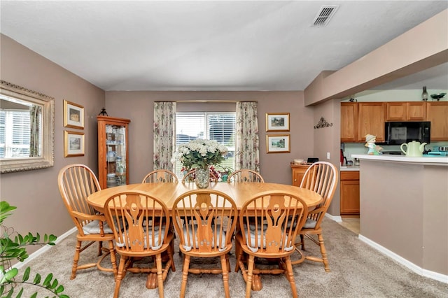 view of carpeted dining room