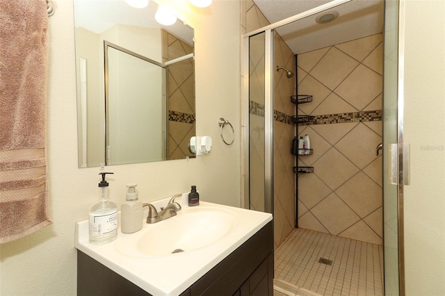 bathroom with vanity and walk in shower