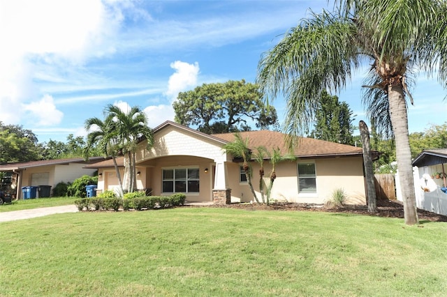 ranch-style house with a front lawn