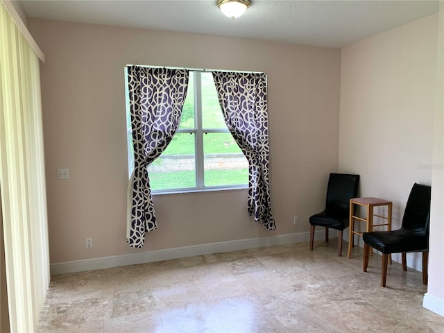 living area with baseboards