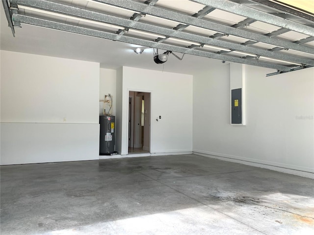 garage featuring electric panel, a garage door opener, and water heater