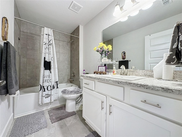 full bathroom with a textured ceiling, vanity, shower / tub combo with curtain, toilet, and tile patterned floors