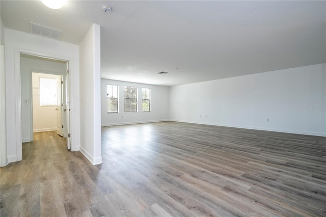 unfurnished room featuring light hardwood / wood-style flooring