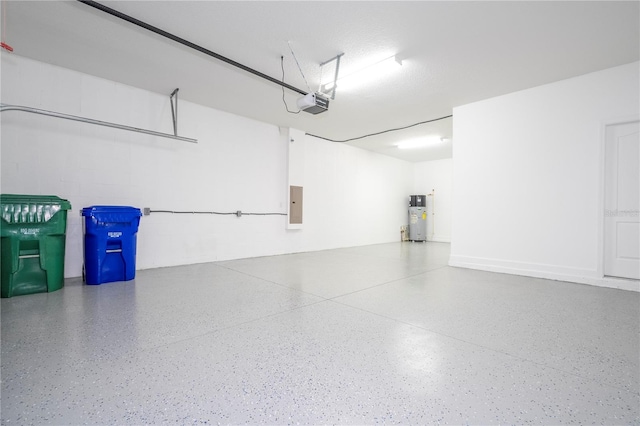 garage featuring electric panel, a garage door opener, and water heater