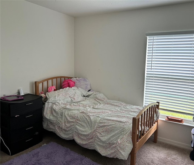 bedroom featuring carpet flooring