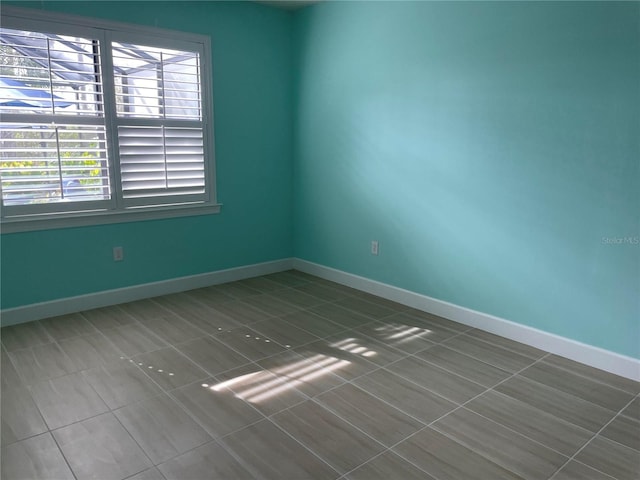 view of tiled spare room