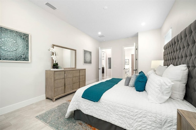 bedroom featuring ensuite bath