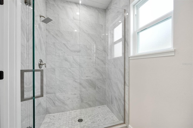 bathroom featuring walk in shower